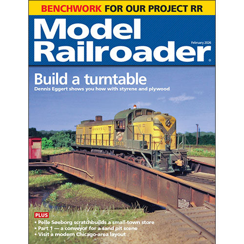 Model Railroader magazine cover with a yellow train on a bridge