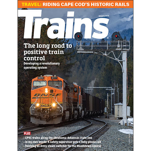 Magazine cover featuring a BNSF train on tracks with a scenic background