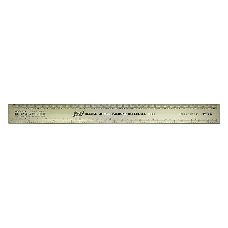 Model railroad reference ruler on a white background